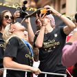 US Women's World Cup players celebrating during a victory parade in New York will have better conditions around matches under terms of a settlement deal