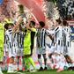 Juventus goalkeeper Gianluigi Buffon holds the Coppa Italia trophy.