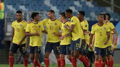 Edwin Cardona (3rd left) and his Colombia teammates celebrate the winning goal against Ecuador