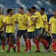 Edwin Cardona (3rd left) and his Colombia teammates celebrate the winning goal against Ecuador