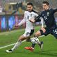 Scotland midfielder Kenny McLean (R) is devastated to be missing his country's Euro 2020 finals campaign due to a knee injury