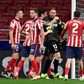 Atletico Madrid players congratulate goalkeeper Jan Oblak after his crucial late penalty save against Alaves