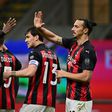 Zlatan Ibrahimovic (R) returned from injury as AC Milan got back winning against Benevento.