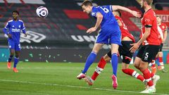 Leicester defender Jonny Evans (C) heads against Southampton