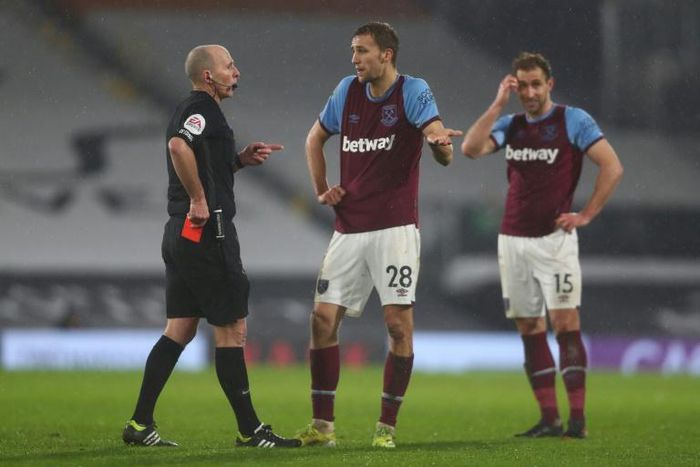 Mike Dean will return to Premier League action and referee Burnley v West Brom after excusing himself last weekend due to death threats received online following his issuing two red cards including one to West Ham's Tomas Soucek