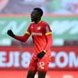 Edmond Tapsoba celebrates equalising for Bayer Leverkusen against Augsburg