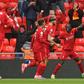 Pointing towards the Champions League: Sadio Mane (right)scored the goals that secured Liverpool a top-four finish