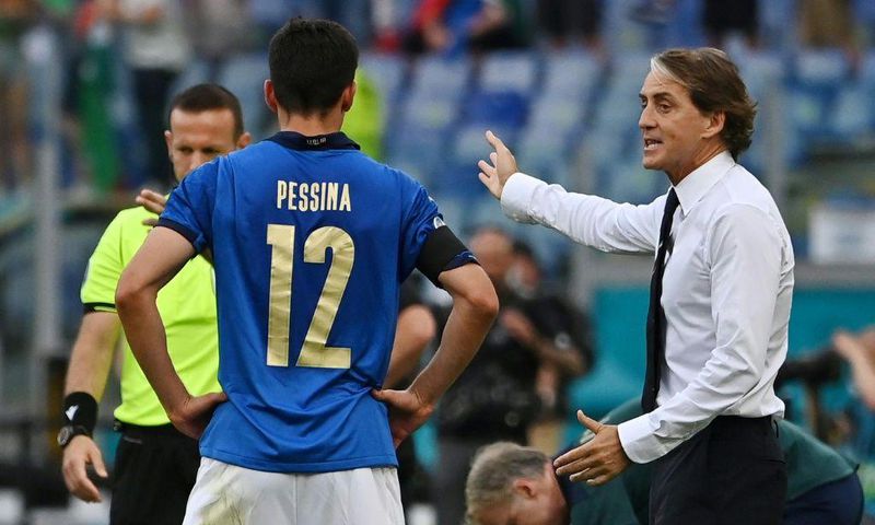 Italy coach Roberto Mancini with goalscorer Matteo Pessina