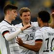 Kai Havertz (L) and Thomas Mueller (C) celebrate with Germany goalscorer Serge Gnabry in a Euro 2020 warm-up win over Latvia