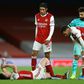 Ligament damage: Arsenal defender Kieran Tierney lies injured during a Premier League match against Liverpool