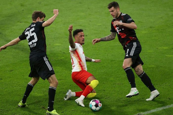 Bayern Munich team-mates Thomas Mueller (L) and Lucas Hernandez (R) will be on opposing sides when France play Germany at Euro 2020 on Tuesday