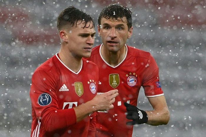 Bayern Munich forward Thomas Mueller (R) and midfielder Joshua Kimmich (L) have been outstanding this season