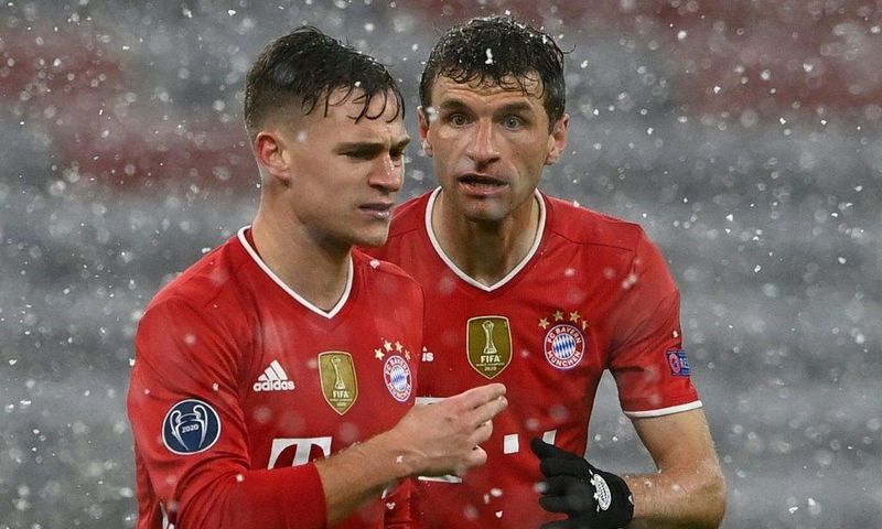 Bayern Munich forward Thomas Mueller (R) and midfielder Joshua Kimmich (L) have been outstanding this season