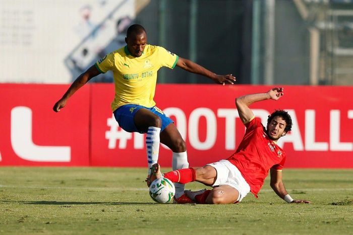 Mamelodi Sundowns forward Gift Motupa (L) is tackled by Al Ahly defender Mohamed Hany during a drawn CAF Champions League quarter-final second leg in Pretoria this weekend.