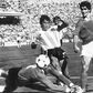 (FILES) In this file photo taken on June 29, 1982 Argentinian goalkeeper Ubaldo Fillol (Bottom) and captain Daniel Passarella (L) prevent Italian striker Paolo Rossi from scoring, during the World Cup second round match between Italy and Argentina in B...