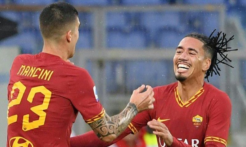 English defender Chris Smalling (R) joined Roma from Manchester United