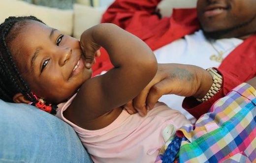 Davido and a smiling Imade
