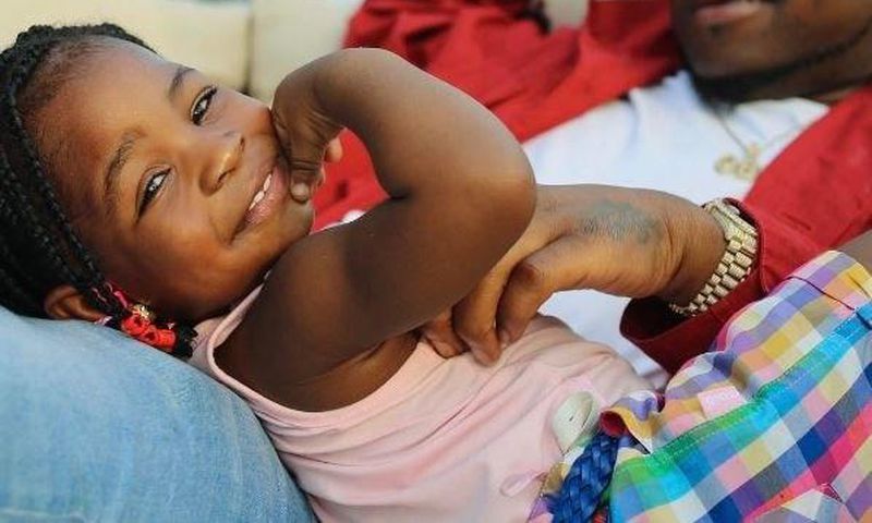 Davido and a smiling Imade