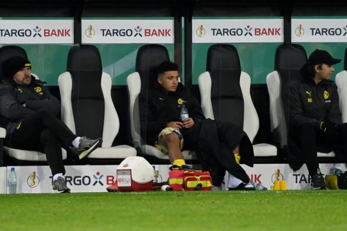 England winger Jadon Sancho will miss Borussia Dortmund's Champions League clash with Sevilla on Tuesday due to injury