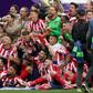 Kieran Trippier (centre) has been key to Atletico Madrid winning La Liga this season.