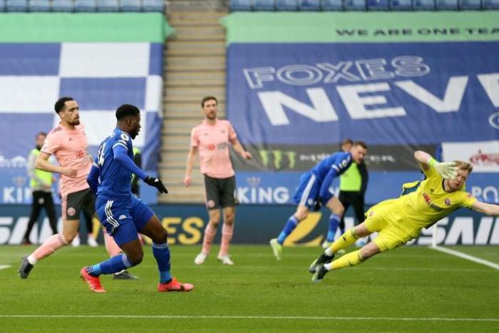 Kelechi Iheanacho (2L) scores the first of his three goals for Leicester City against Sheffield United at the weekend