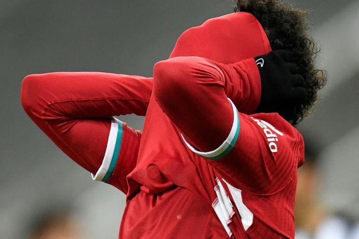 Liverpool's Mohamed Salah reacts after failing to score against Newcastle