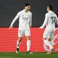 Double act: Marco Asensio celebrates after Lucas Vazquez set up his goal against Celta