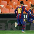 Team work: Lionel Messi runs to celebrate with Antoine Griezmann