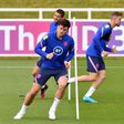England defender Harry Maguire (left) is fit to return against Scotland