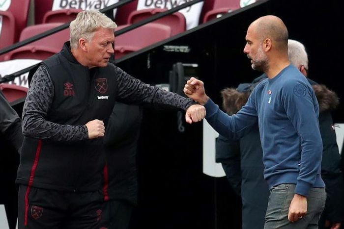 Pep Guardiola (right) has praised the work of David Moyes at West Ham