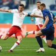 Robert Lewandowski (L) has scored just two goals in 12 matches for Poland at international tournaments