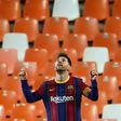 Messi celebrates his double at Valencia the day before hosting a party for his Barcelona teammates