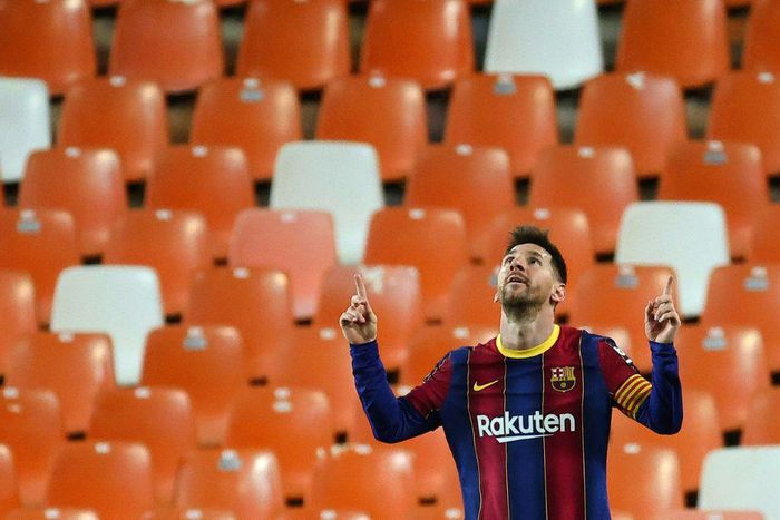 Messi celebrates his double at Valencia the day before hosting a party for his Barcelona teammates