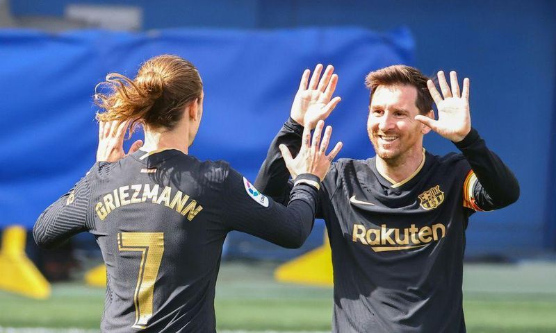 Antoine Griezmann (left) scored twice as Barcelona beat Villarreal 2-1 on Sunday