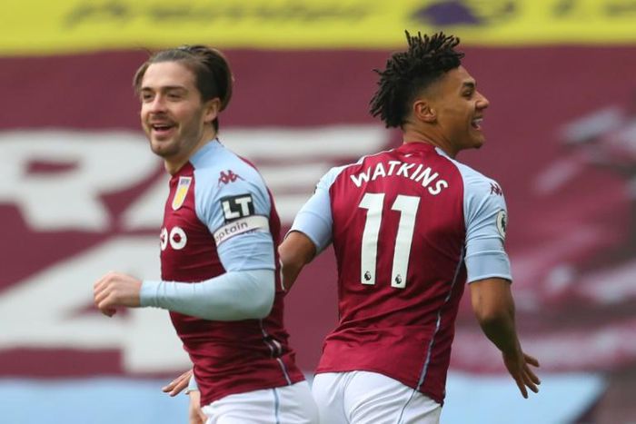 Aston Villa striker Ollie Watkins (R) celebrates with Jack Grealish