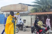 Archbishop Samson Benjamin embarks on a one-man protest with a coffin on his head