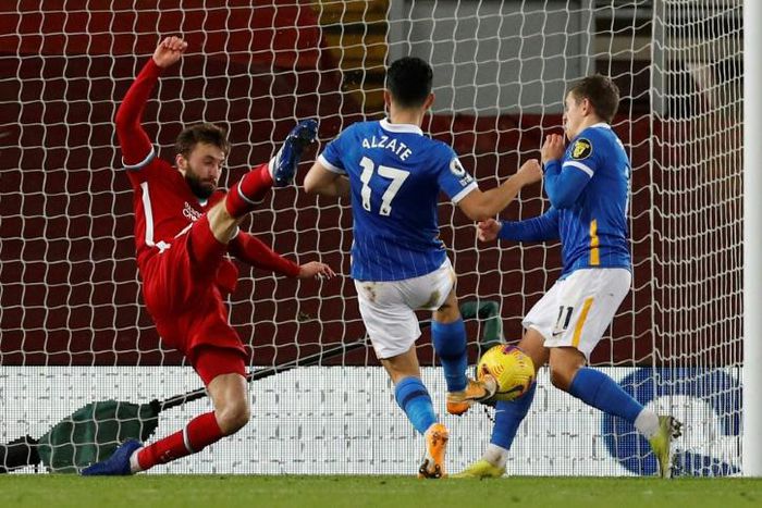 Steven Alzate (centre) scores for Brighton against Liverpool