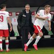 Robert Lewandowski (L) limped off with a knee injury during Poland's 3-0 win over Andorria on Sunday in a World Cup qualifier