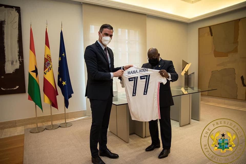Spanish Prime Minister presents a Real Madrid jersey to Nana Addo as his birthday present.