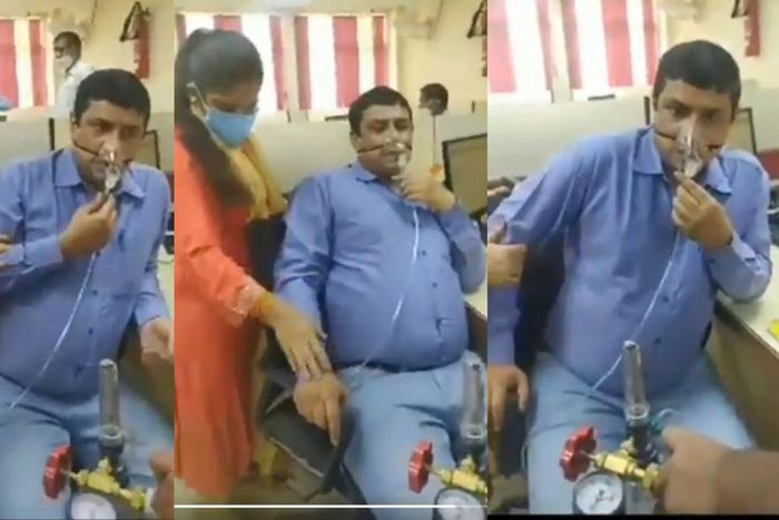 Covid-19 suffering banker goes to work with oxygen support