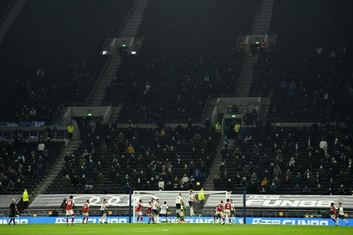 Fans returned to watch Harry Kane and Tottenham shut out Arsenal to stay top of the league