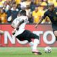 Lebogang Manyama (R) scored a hat-trick for Kaizer Chiefs on Wednesday -- only the third player to achieve the feat in the South African Premiership this season.