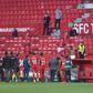 Not so fast: Players in the Sevilla v Granada match return to the pitch to play one more minute