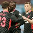 Liverpool's Sadio Mane (C) celebrates scoring against Aston Villa