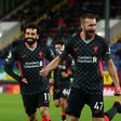 Closing in on Champions League: Nathaniel Phillips (centre)scored Liverpool's second goal in a 3-0 win over Burnley