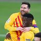 Ilaix Moriba (R) celebrates with Lionel Messi after scoring Barcelona's second goal against Osasuna on Saturday
