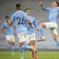 Manchester City midfielder Phil Foden (right) celebrates scoring against Brighton