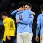 Manchester City midfielder Phil Foden (second right) celebrates his goal against Borussia Dortmund
