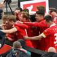 Union Berlin striker Max Kruse (C) is mobbed by team-mates after his winning goal
