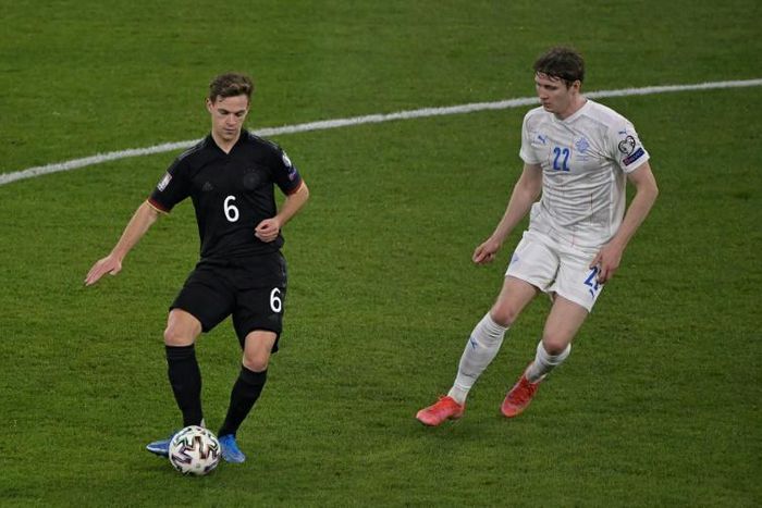 Joshua Kimmich (L) helped create both of Germany's first-half goals against  Iceland